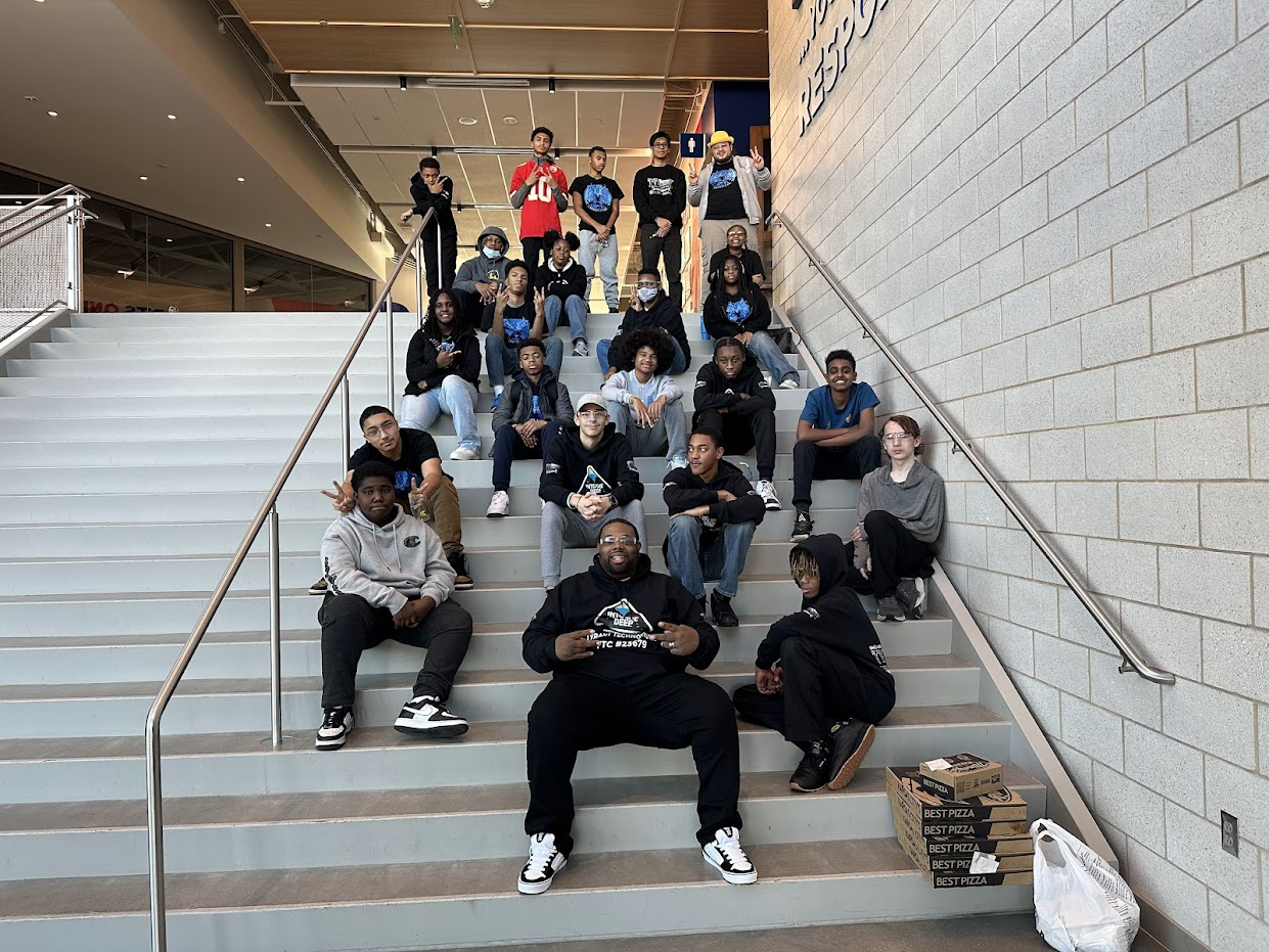 WeCodeKC robotics team gathered on the stairs